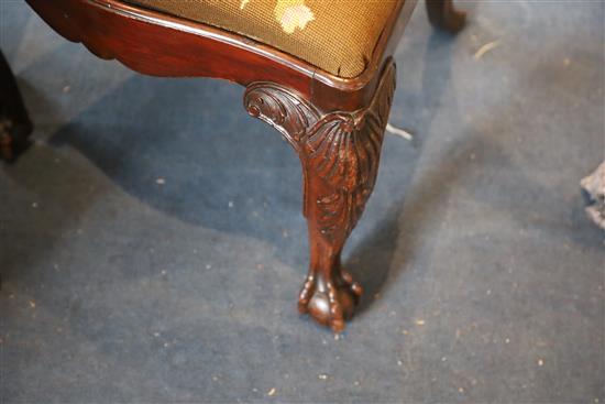 A set of eight George II style Irish red walnut and oak dining chairs, W.1ft 9in. H.3ft 3in.